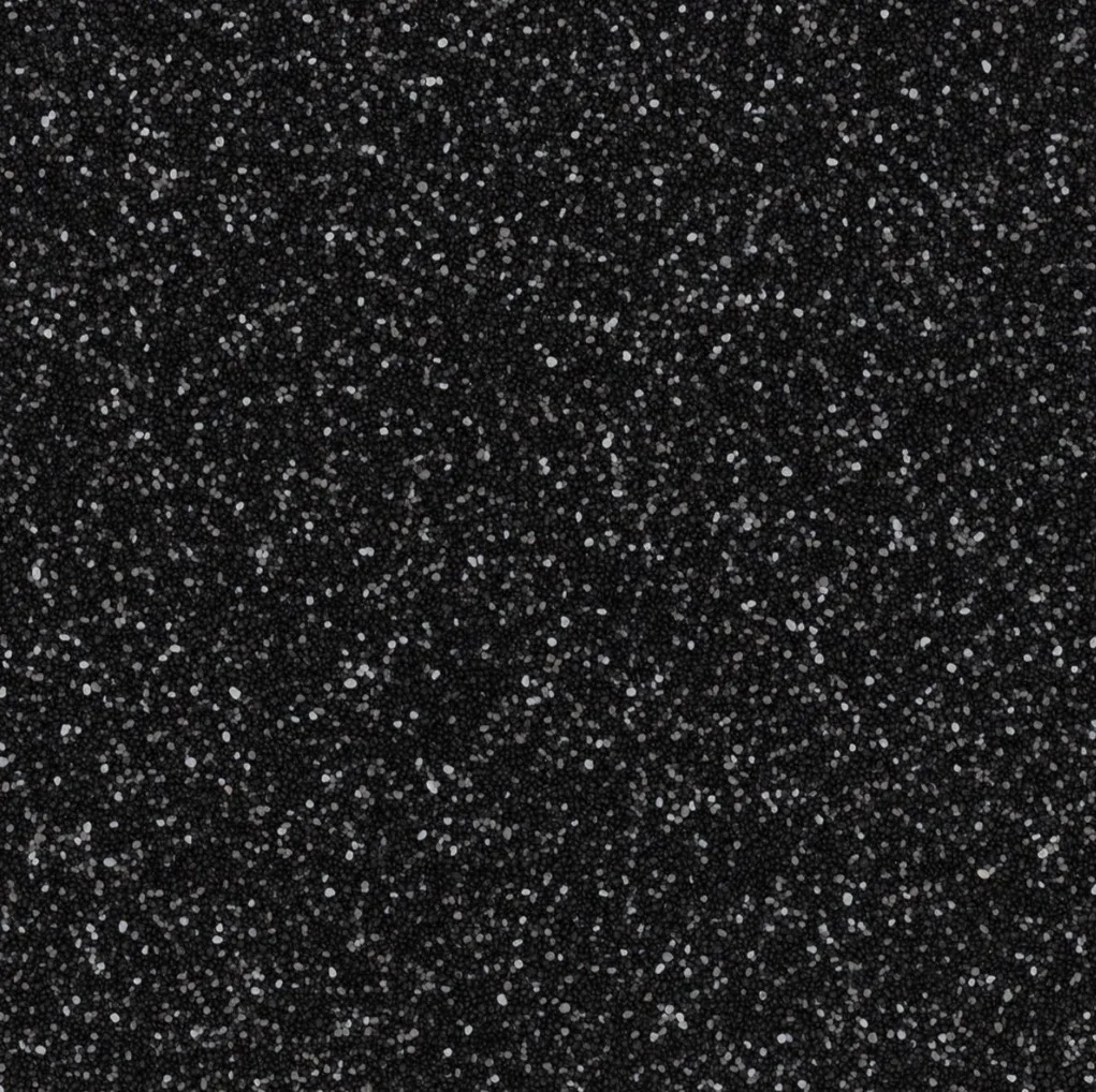 Black epoxy floor with white aggregate chips, uniform finish